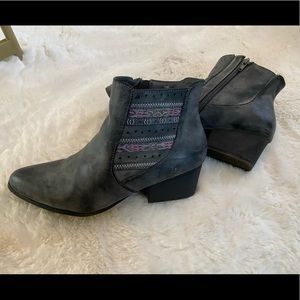 Grey, cowboy inspired ankle boot with low heel.